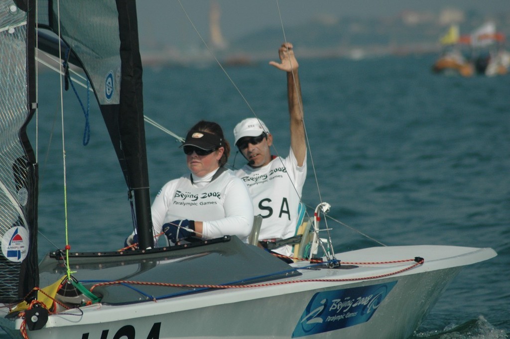 Nick Scandone and Maureen Mckinnon-Tucker win the Gold Medal for the USA in the SKUD 19 class at the 2008 Paralympics    © Mike Pinckney